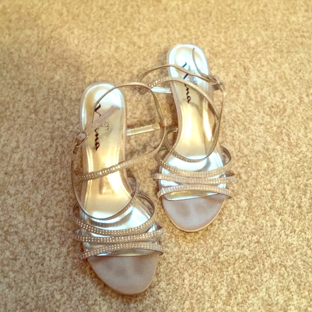 Silver heels size 7.5, lightly worn